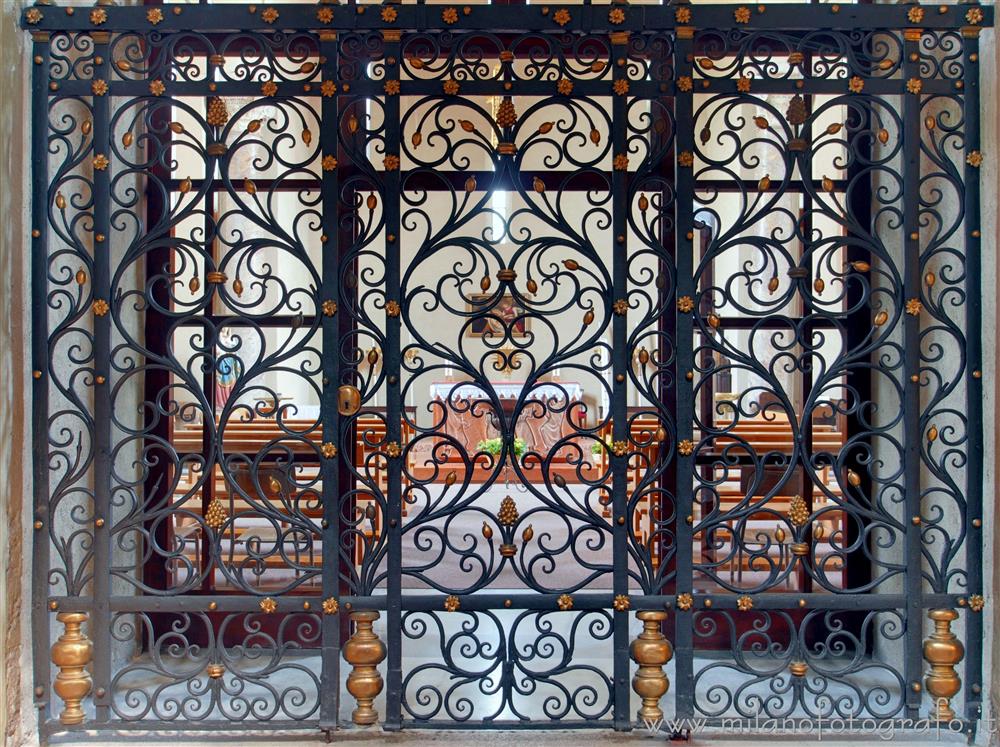 Milan (Italy) - Entrance gate of the St. Ippolitus Chapel in the Basilica of San Lorenzo Maggiore